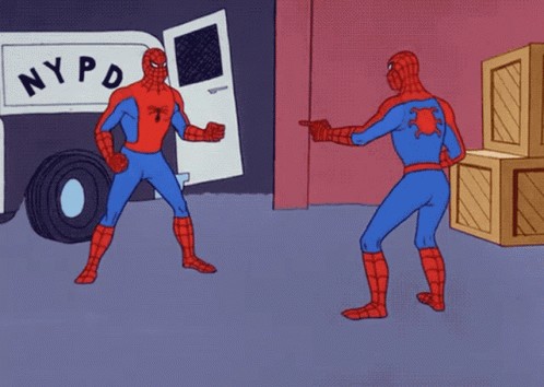 Two Spider-Man characters pointing at each other